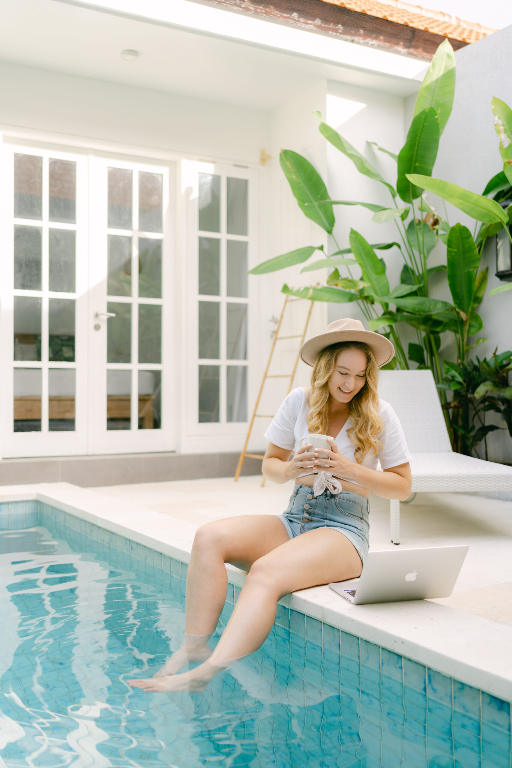 Social media manager planning out content ideas on content calendar