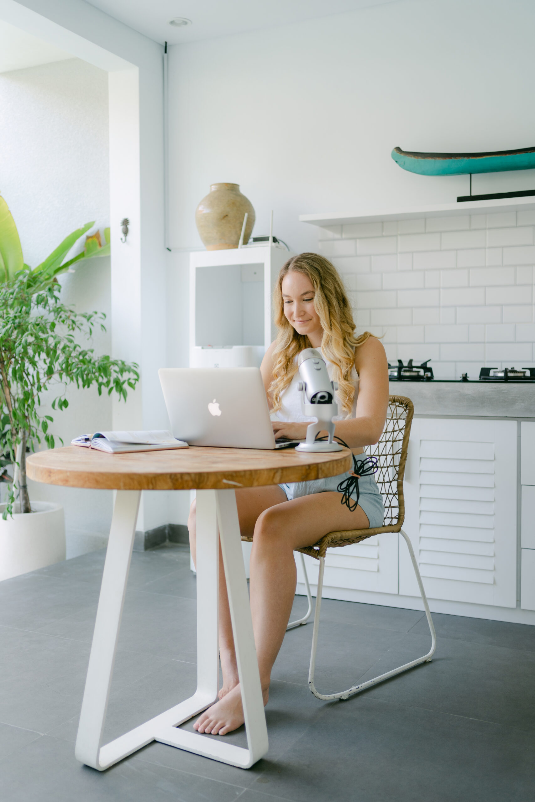 A freelancer planning social media strategies on their laptop, preparing to find their first social media client.