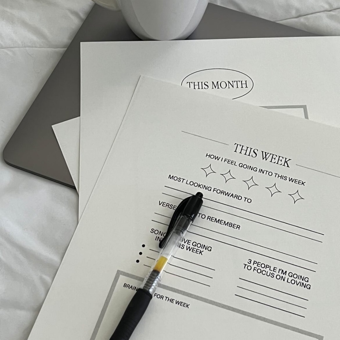 Freelance goal setting written in planner with coffee